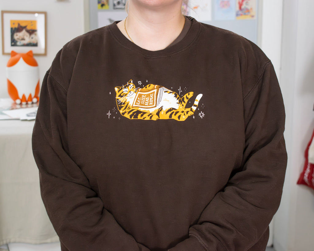 Eat, sleep, read, repeat - Screen Printed Sweatshirt