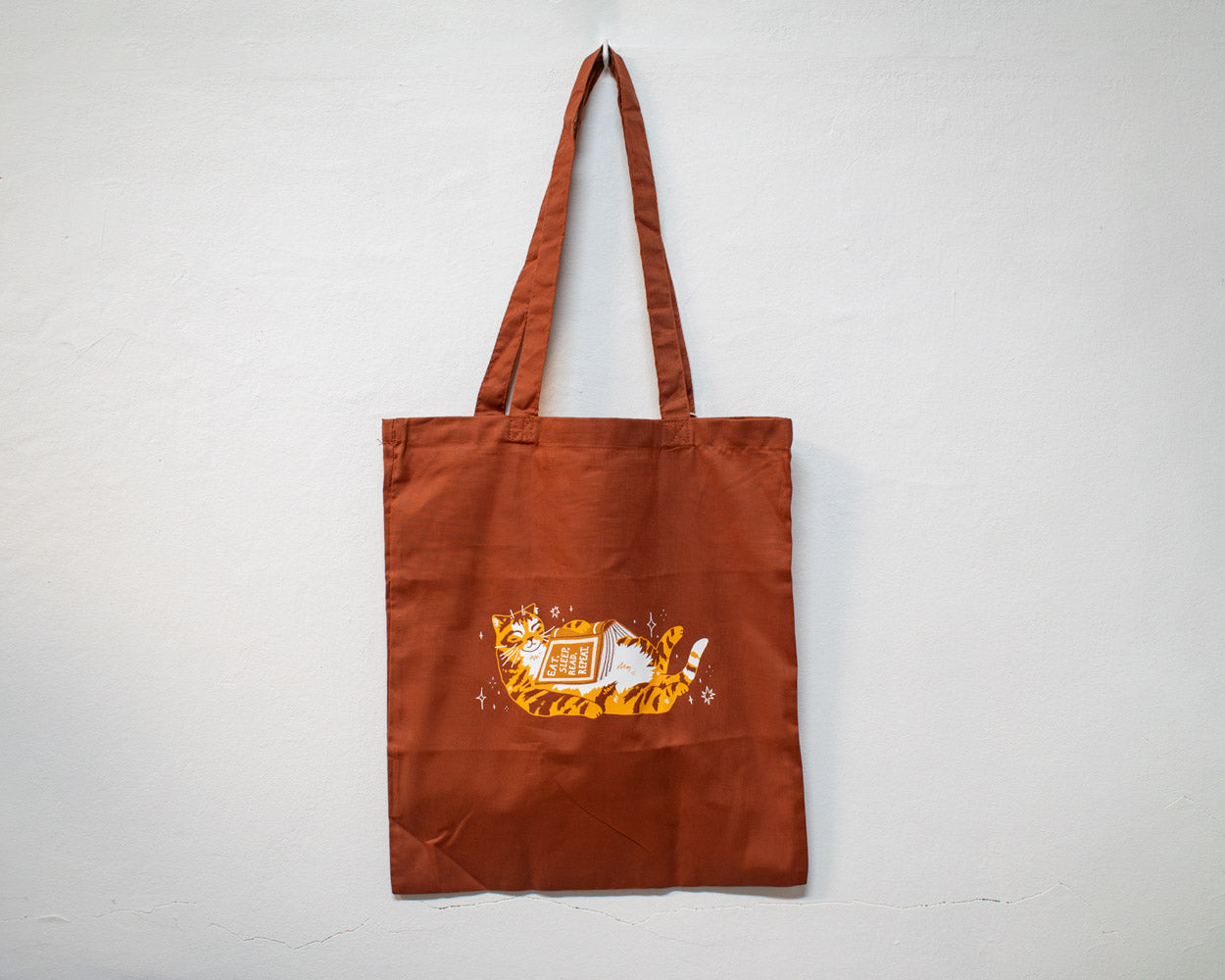 Eat, sleep, read, repeat - Screen Printed Tote Bag (rusty orange)