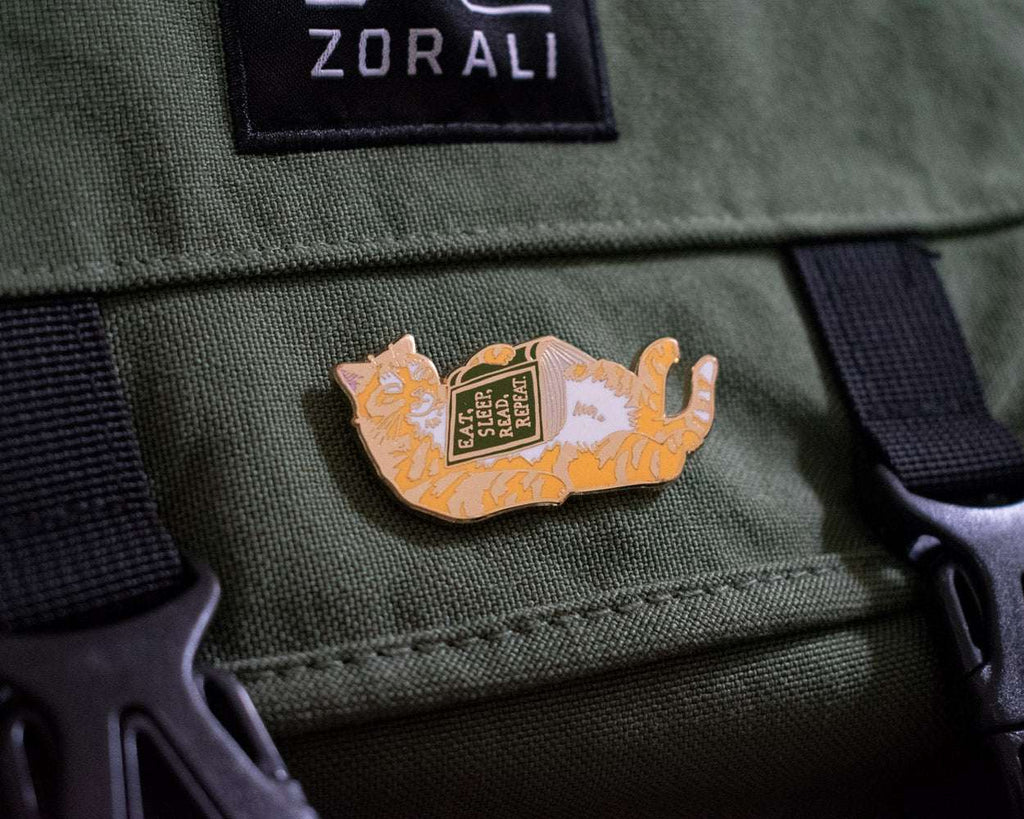 Eat, sleep, read, repeat - Hard Enamel Pin