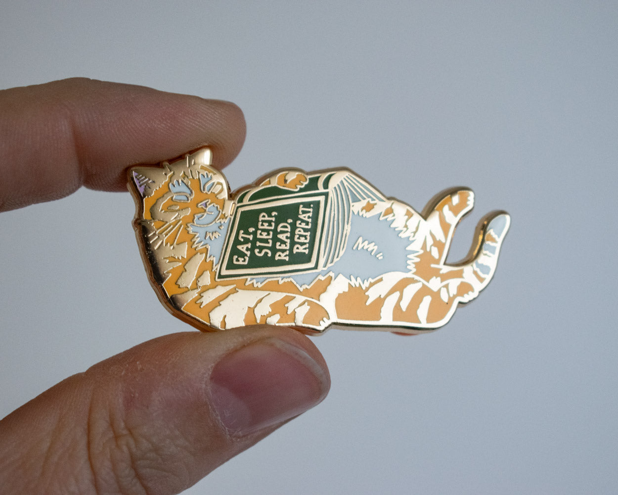 Eat, sleep, read, repeat - Hard Enamel Pin