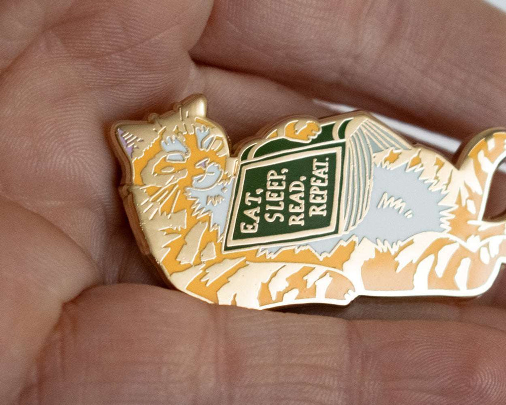 Eat, sleep, read, repeat - Hard Enamel Pin