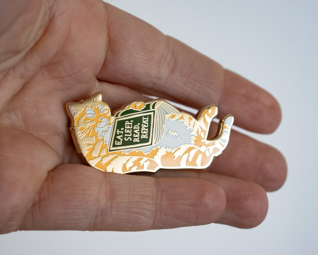 Eat, sleep, read, repeat - Hard Enamel Pin
