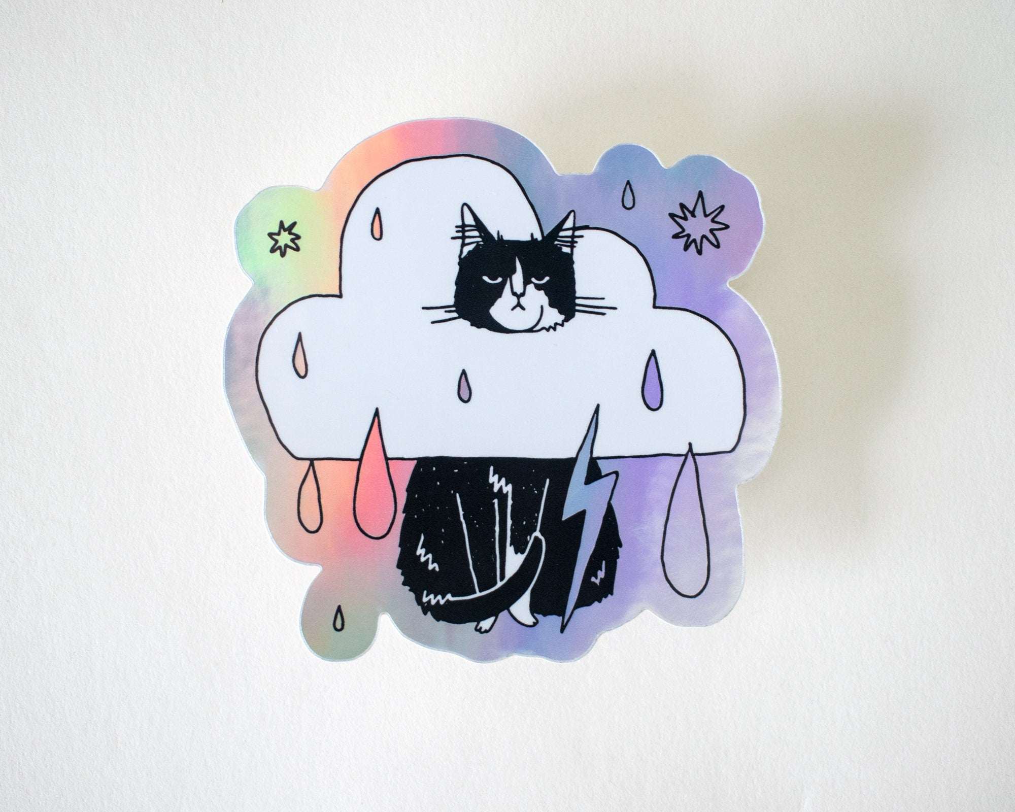 Rain Cloud Cat - Light mode | Holographic Vinyl Stickers of a grumpy Tuxedo Cat in a rain cloud costume