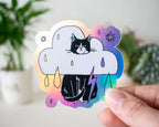 Rain Cloud Cat - Light mode | Holographic Vinyl Stickers of a grumpy Tuxedo Cat in a rain cloud costume