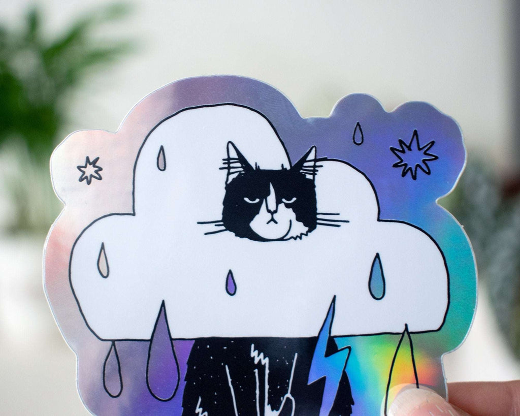 Rain Cloud Cat - Light mode | Holographic Vinyl Stickers of a grumpy Tuxedo Cat in a rain cloud costume