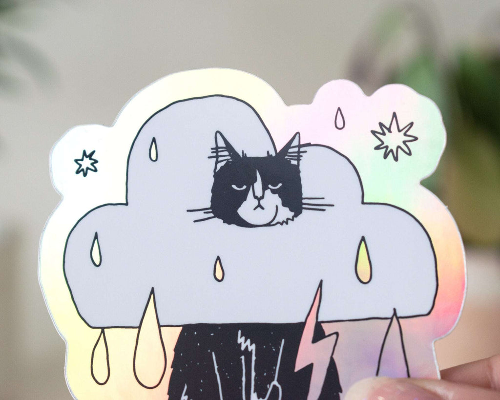 Rain Cloud Cat - Light mode | Holographic Vinyl Stickers of a grumpy Tuxedo Cat in a rain cloud costume