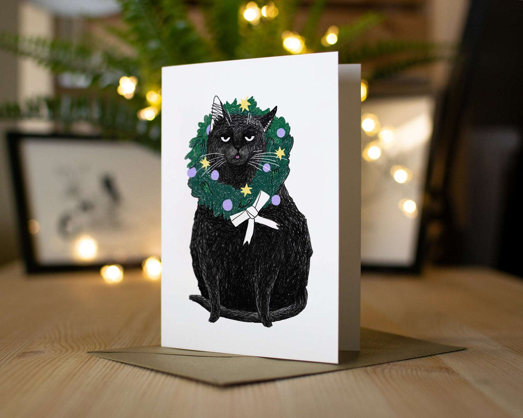 Funny Black Cat Christmas Card: Holly Blep Wreath Illustration