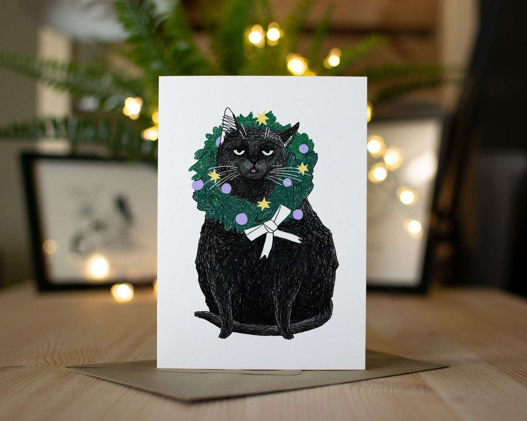 Funny Black Cat Christmas Card: Holly Blep Wreath Illustration