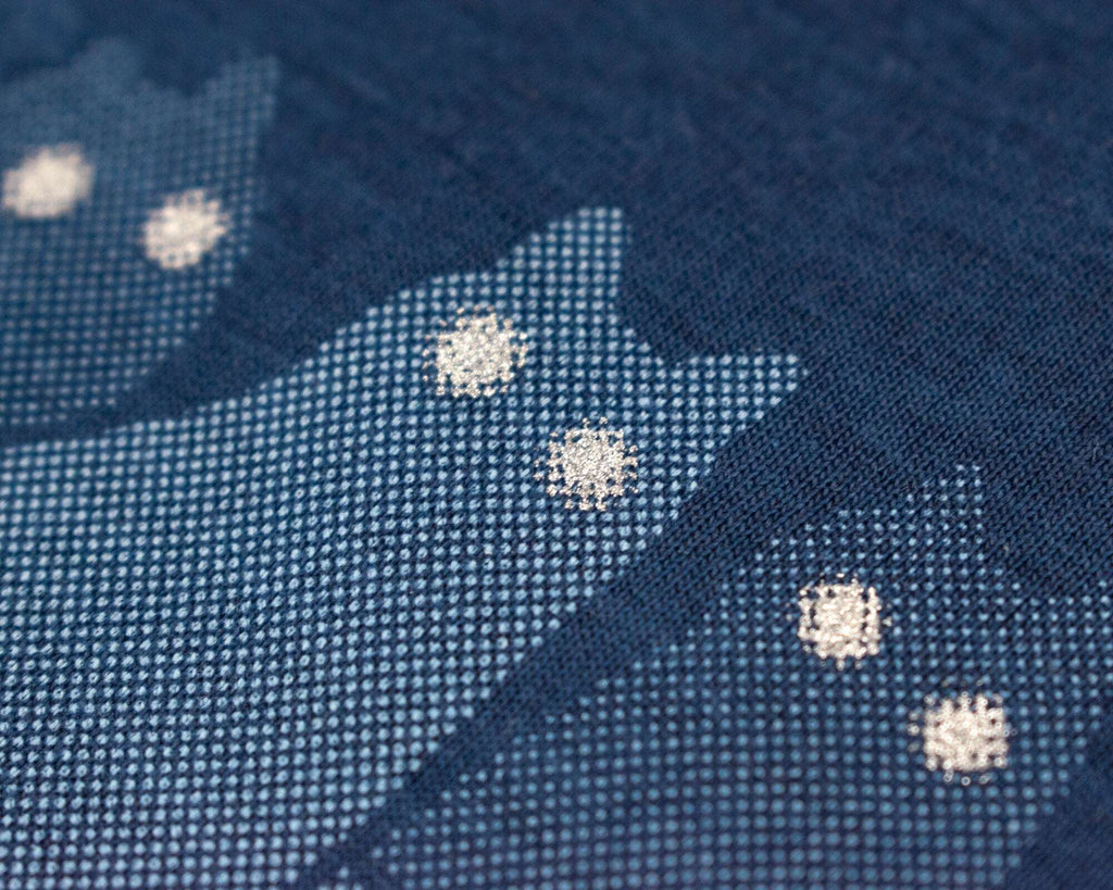 Reflecting cat eyes t-shirt | Hand screen printed on blue organic cotton tee with reflective ink