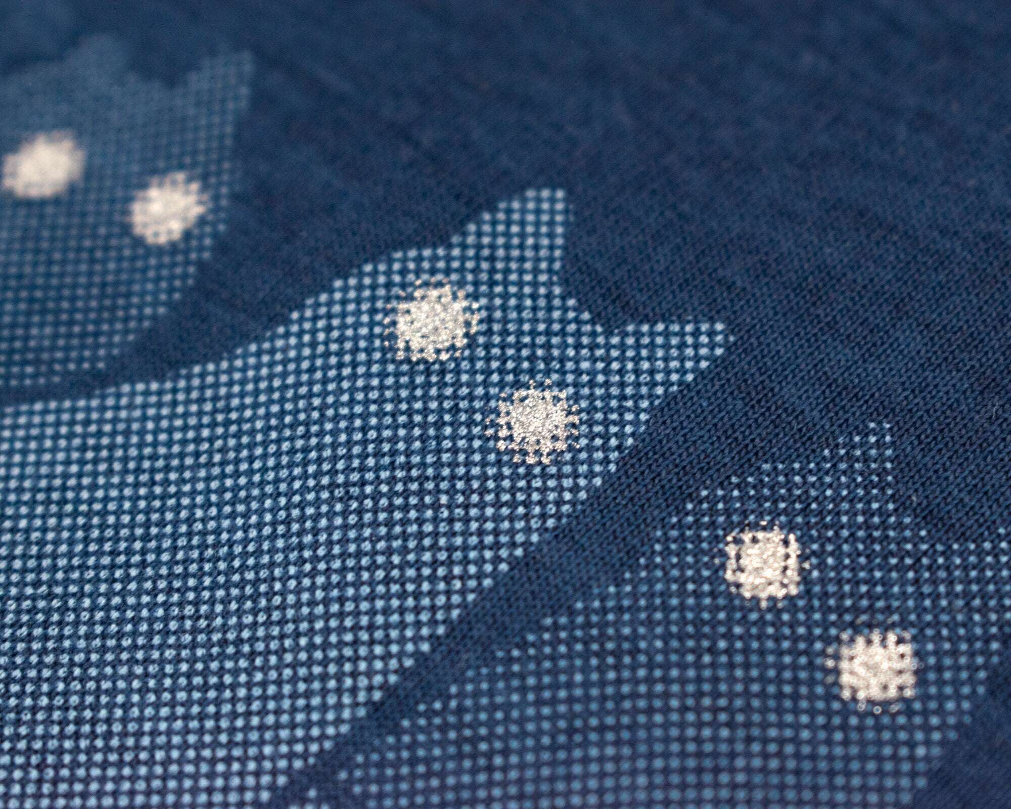Reflecting cat eyes t-shirt | Hand screen printed on blue organic cotton tee with reflective ink