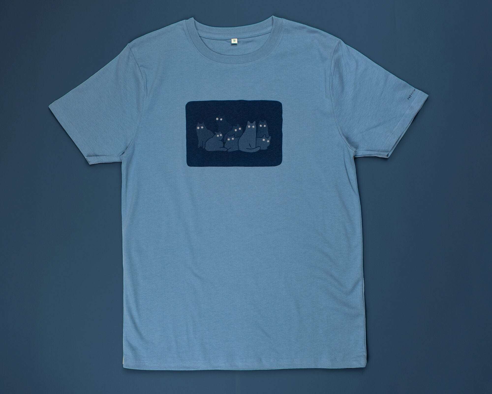 Reflecting cat eyes t-shirt | Hand screen printed on blue organic cotton tee with reflective ink