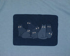 Reflecting cat eyes t-shirt | Hand screen printed on blue organic cotton tee with reflective ink