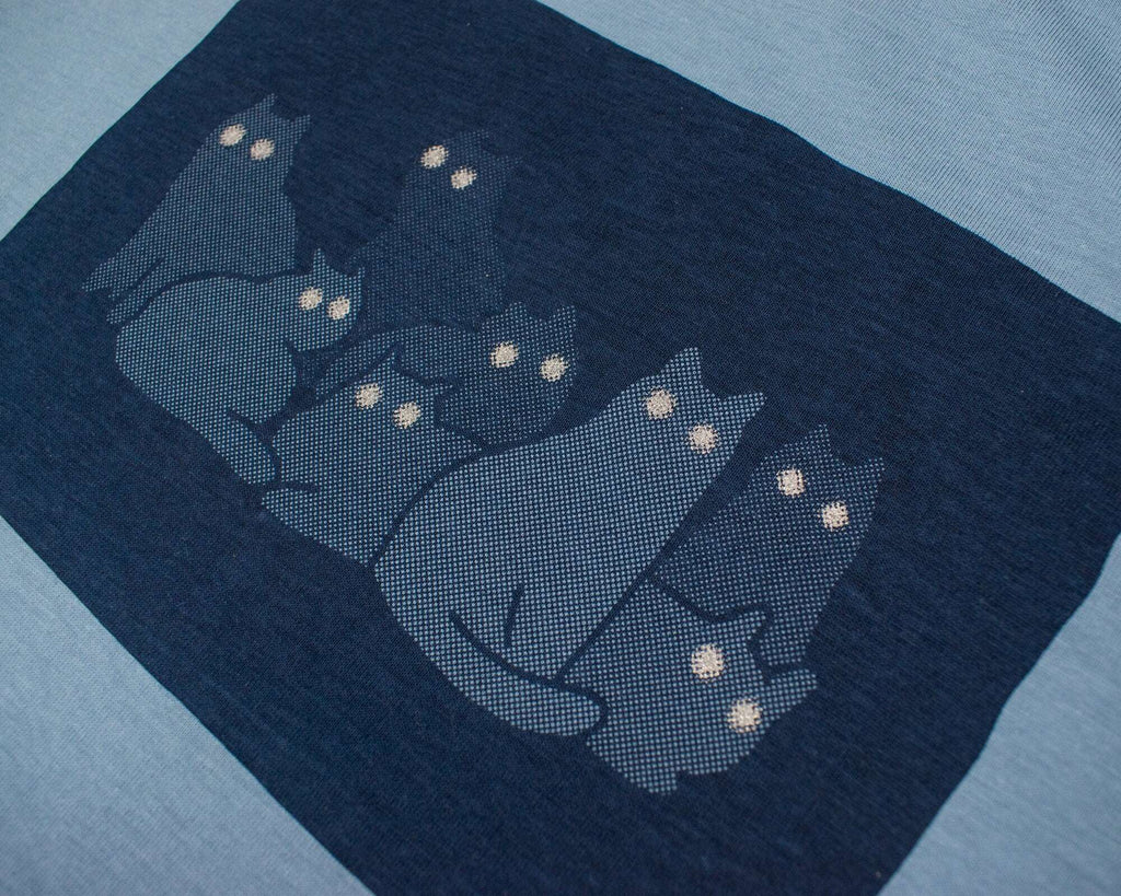 Reflecting cat eyes t-shirt | Hand screen printed on blue organic cotton tee with reflective ink
