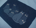 Reflecting cat eyes t-shirt | Hand screen printed on blue organic cotton tee with reflective ink