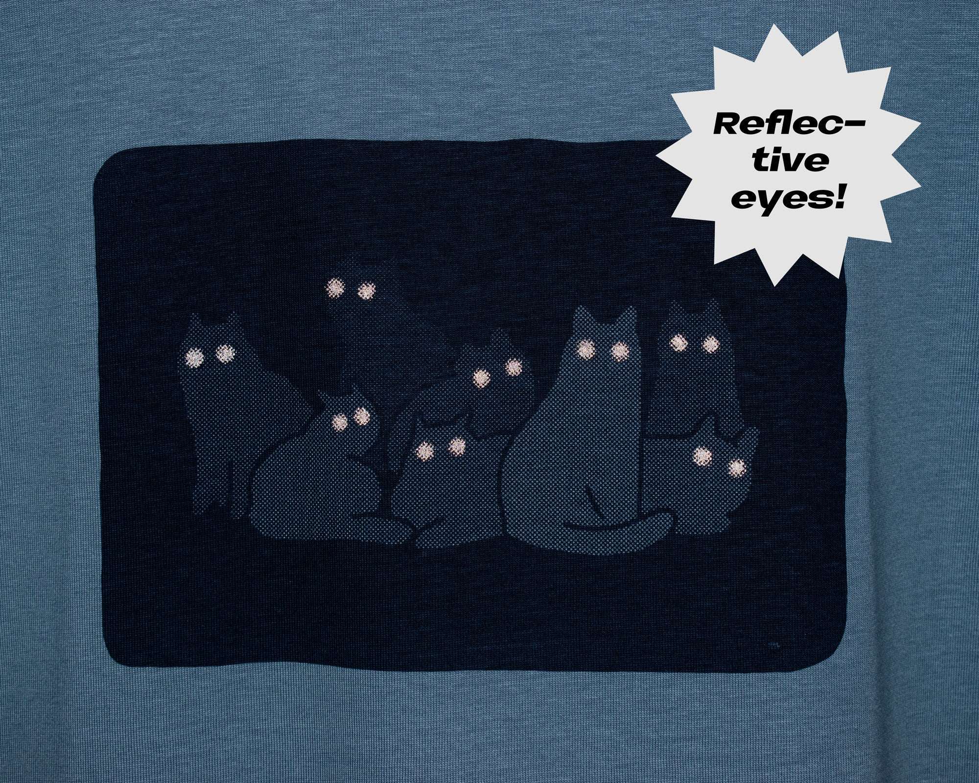 Reflecting cat eyes t-shirt | Hand screen printed on blue organic cotton tee with reflective ink