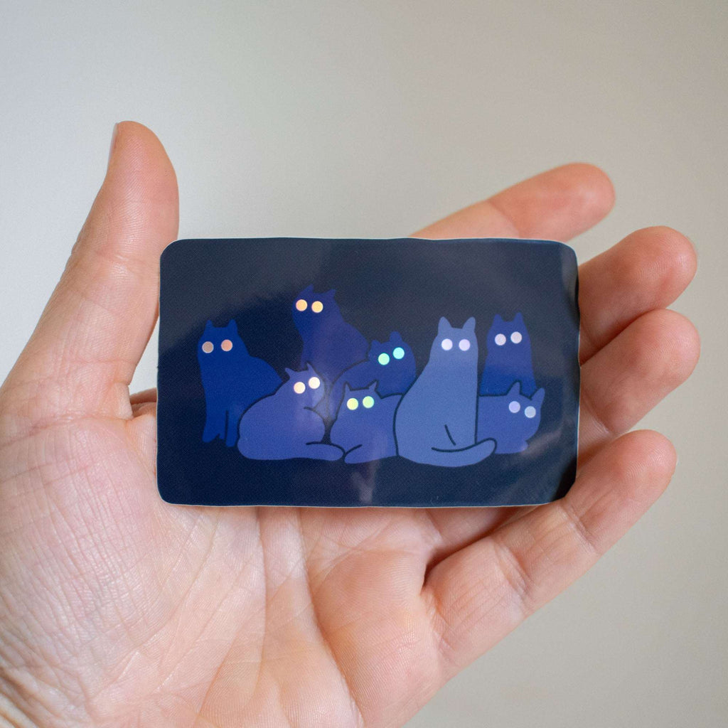 Reflecting Cat Eyes | Spooky holographic vinyl sticker of a cat gangs silhouettes who's eyes are glowing in the night