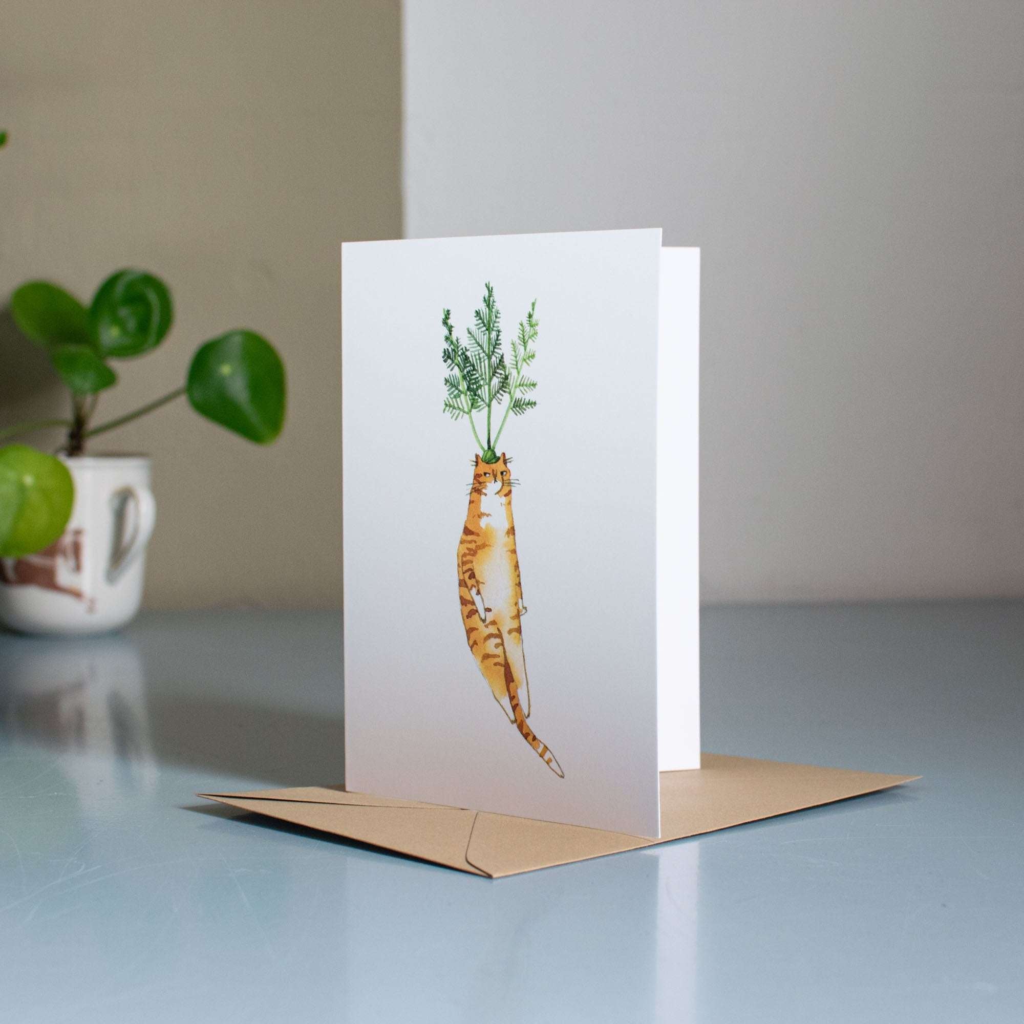 Carrot Cat Greeting Card: Grumpy Tabby Illustration