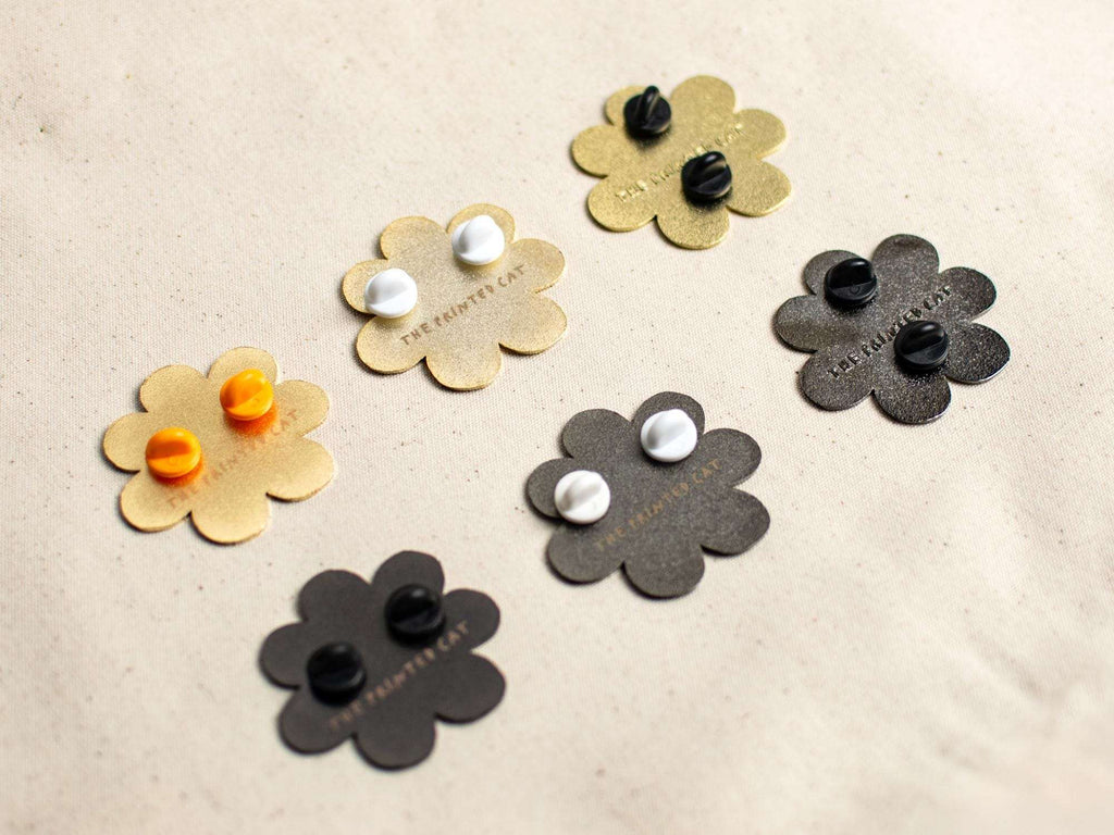 Grumpy Flower Cat Hard Enamel Pin | Gold or black nickel plated brooch with grumpy cat available as black, white and orange tabby fur color