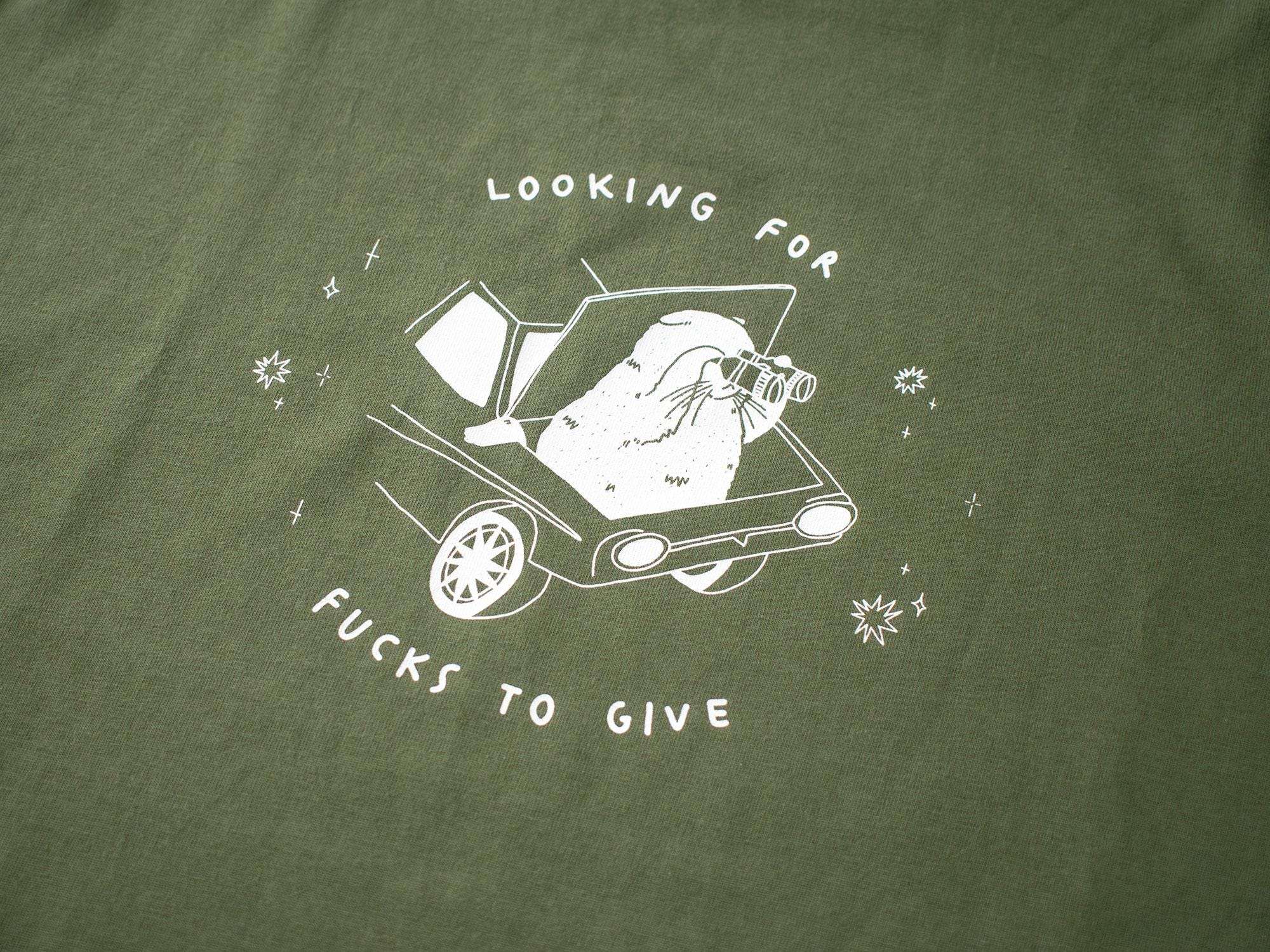 T-shirt: Looking for f***s to give | Hand screen printed olive green organic cotton tee with white illustration of a cat with binoculars