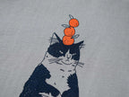 Orange Cat t-shirt | Hand screen printed illustration of a cat balancing oranges on grey organic cotton tee with navy and orange