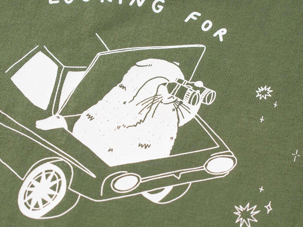T-shirt: Looking for f***s to give | Hand screen printed olive green organic cotton tee with white illustration of a cat with binoculars
