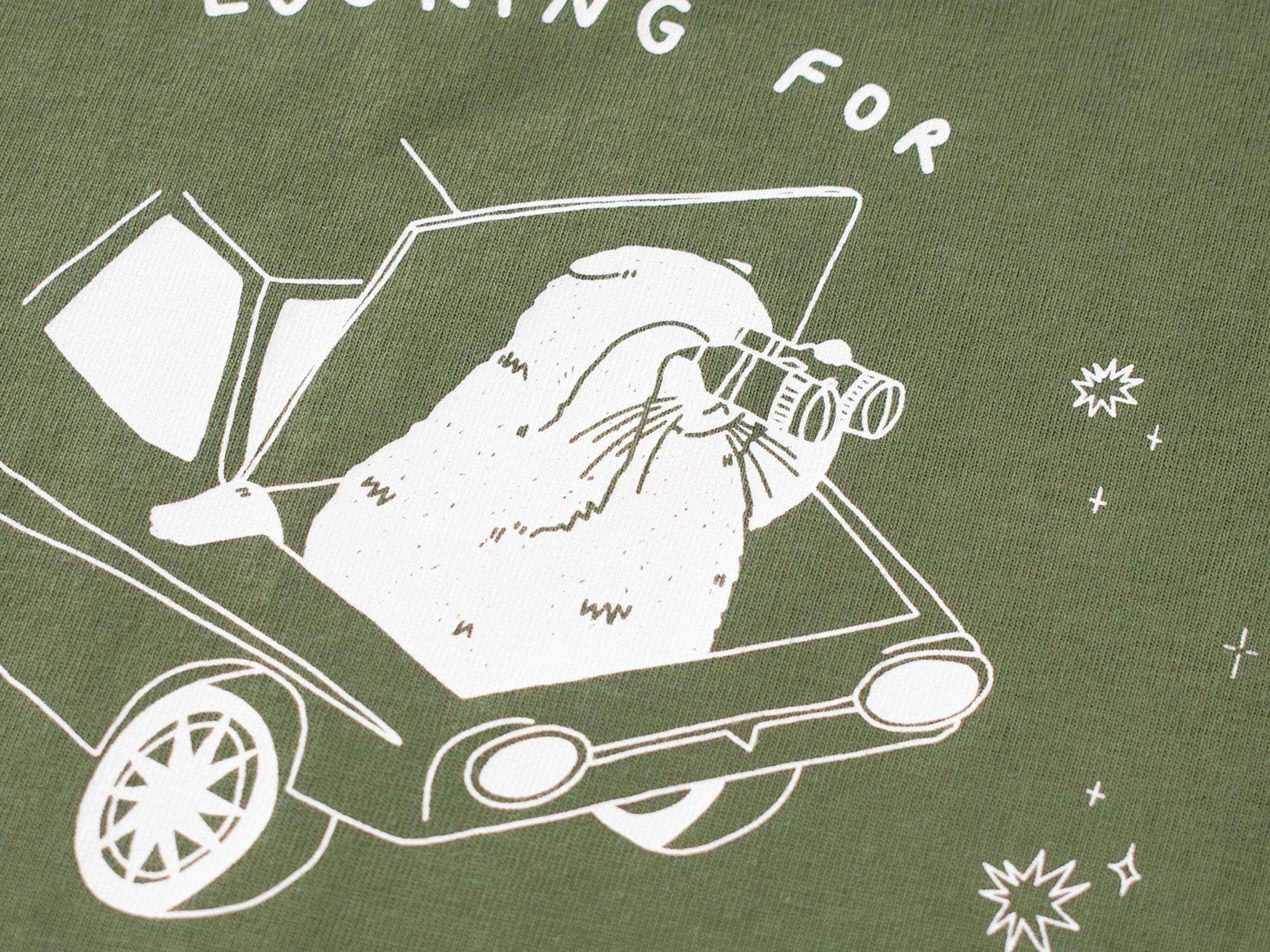 T-shirt: Looking for f***s to give | Hand screen printed olive green organic cotton tee with white illustration of a cat with binoculars