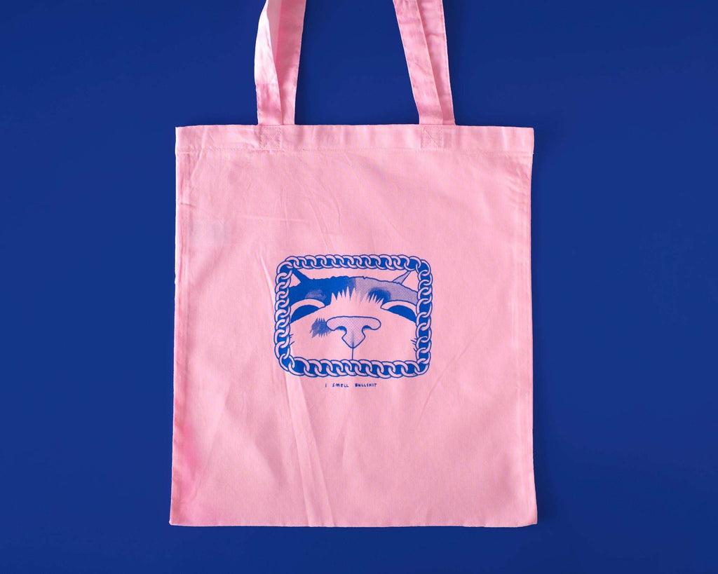 I smell bullshit tote bag | Hand screen printed light pink 100% cotton tote bag with illustration of a cat sniffing out lies