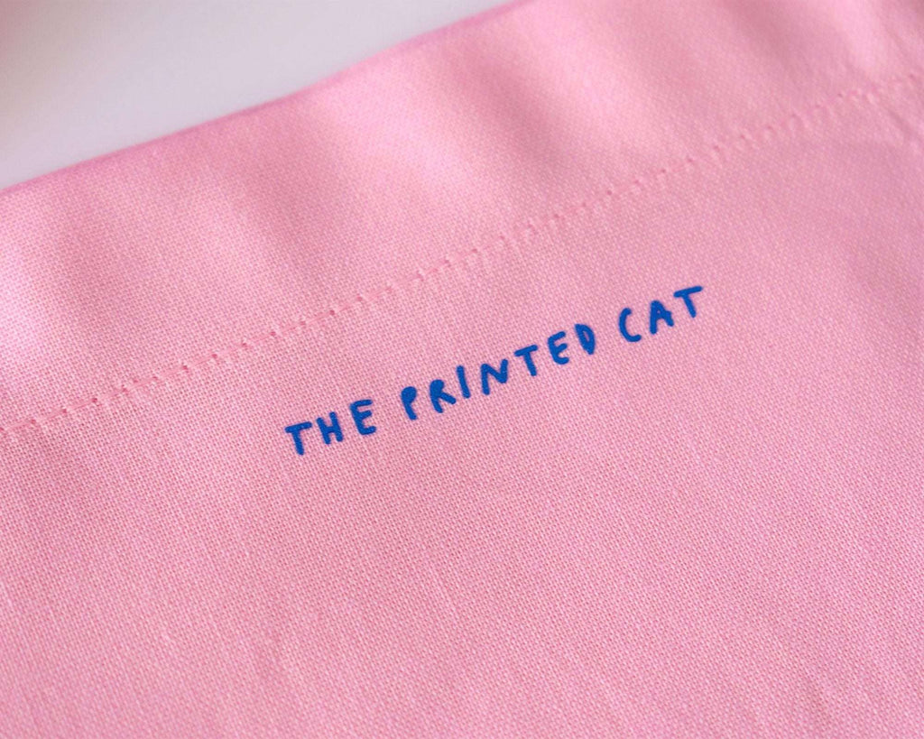 I smell bullshit tote bag | Hand screen printed light pink 100% cotton tote bag with illustration of a cat sniffing out lies