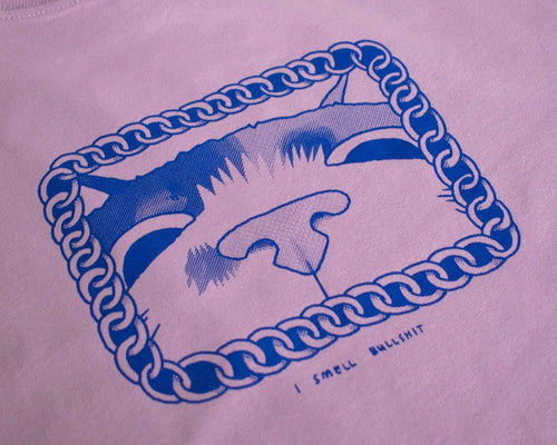 I smell Bullshit t-shirt | Hand screen printed on lilac organic cotton tee with blue illustration of a cat sniffing out your lies