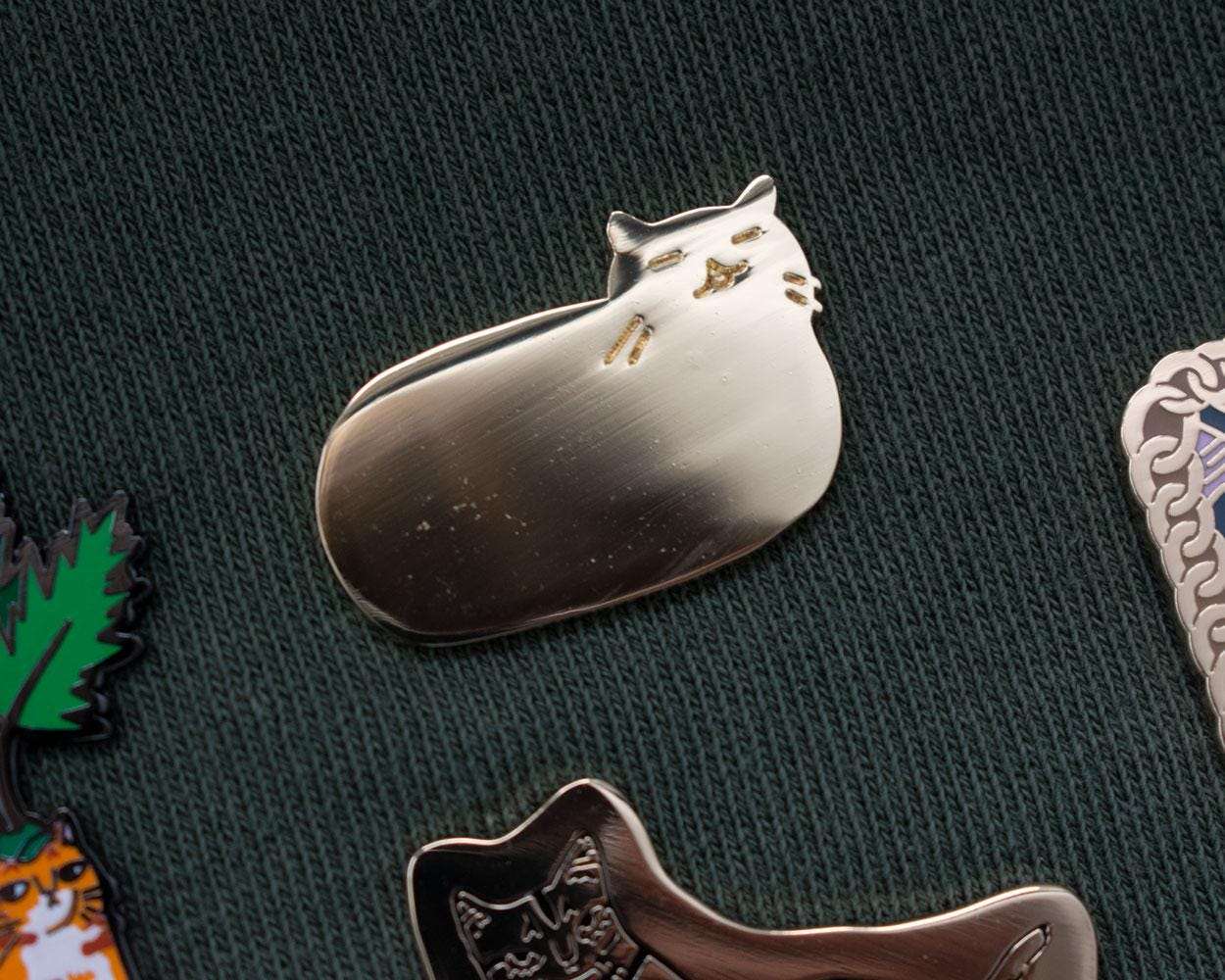 Golden Cat Loaf Enamel Pin | Gold plated brooch with a cat sitting as loaf