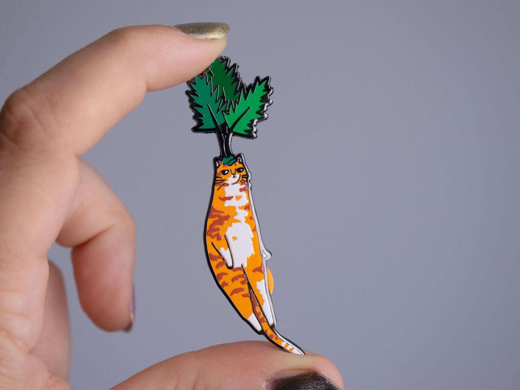 Carrot cat enamel pin | Black nickel plated brooch with an orange tabby cat or is it a carrot? Huh?