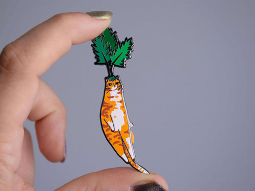 Carrot cat enamel pin | Black nickel plated brooch with an orange tabby cat or is it a carrot? Huh?
