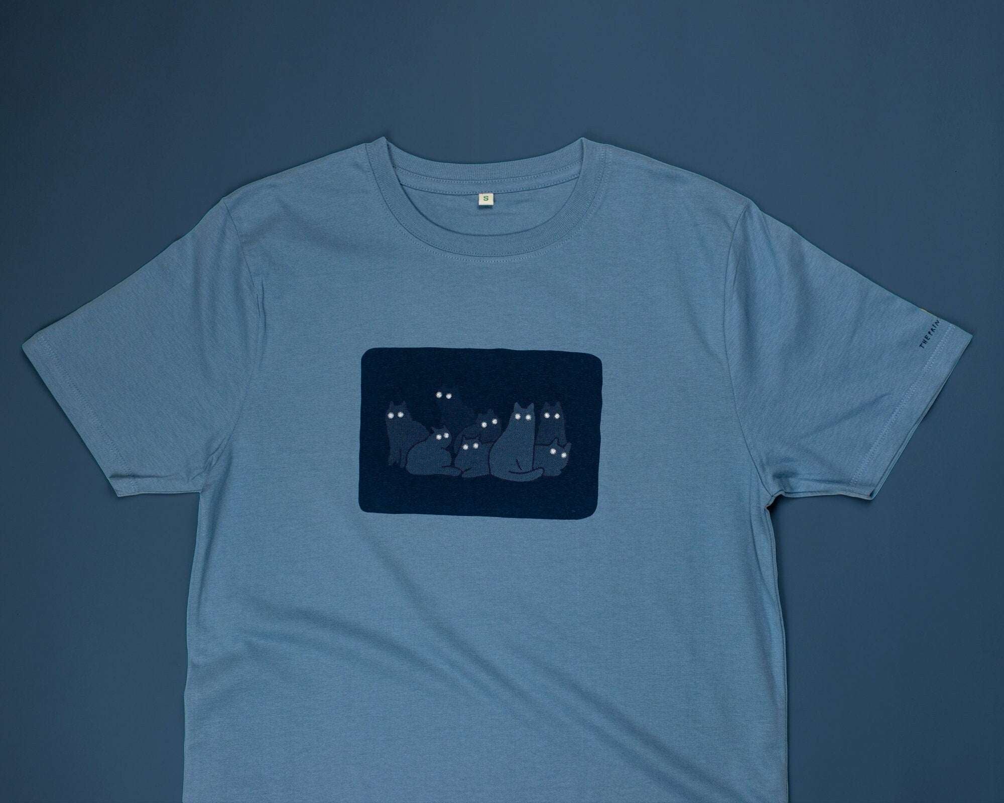 Reflecting cat eyes t-shirt | Hand screen printed on blue organic cotton tee with reflective ink