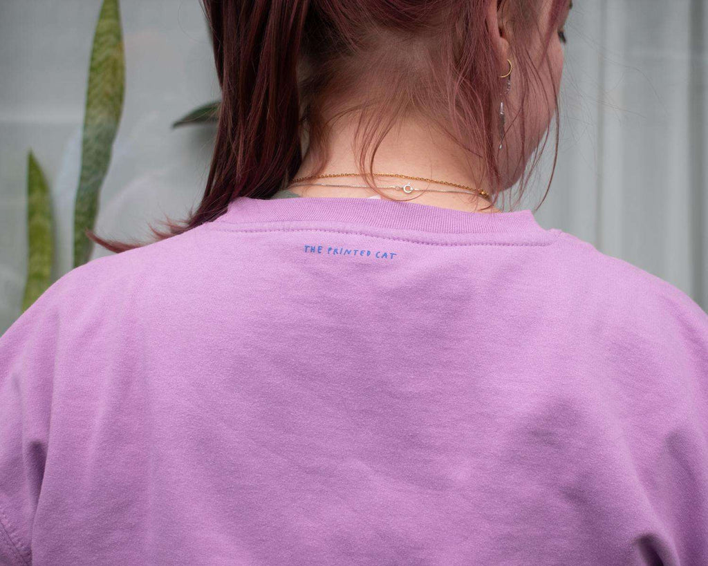 I smell bullshit cat sweatshirt with a hand screen printed illustration of a cat sniffing out lies