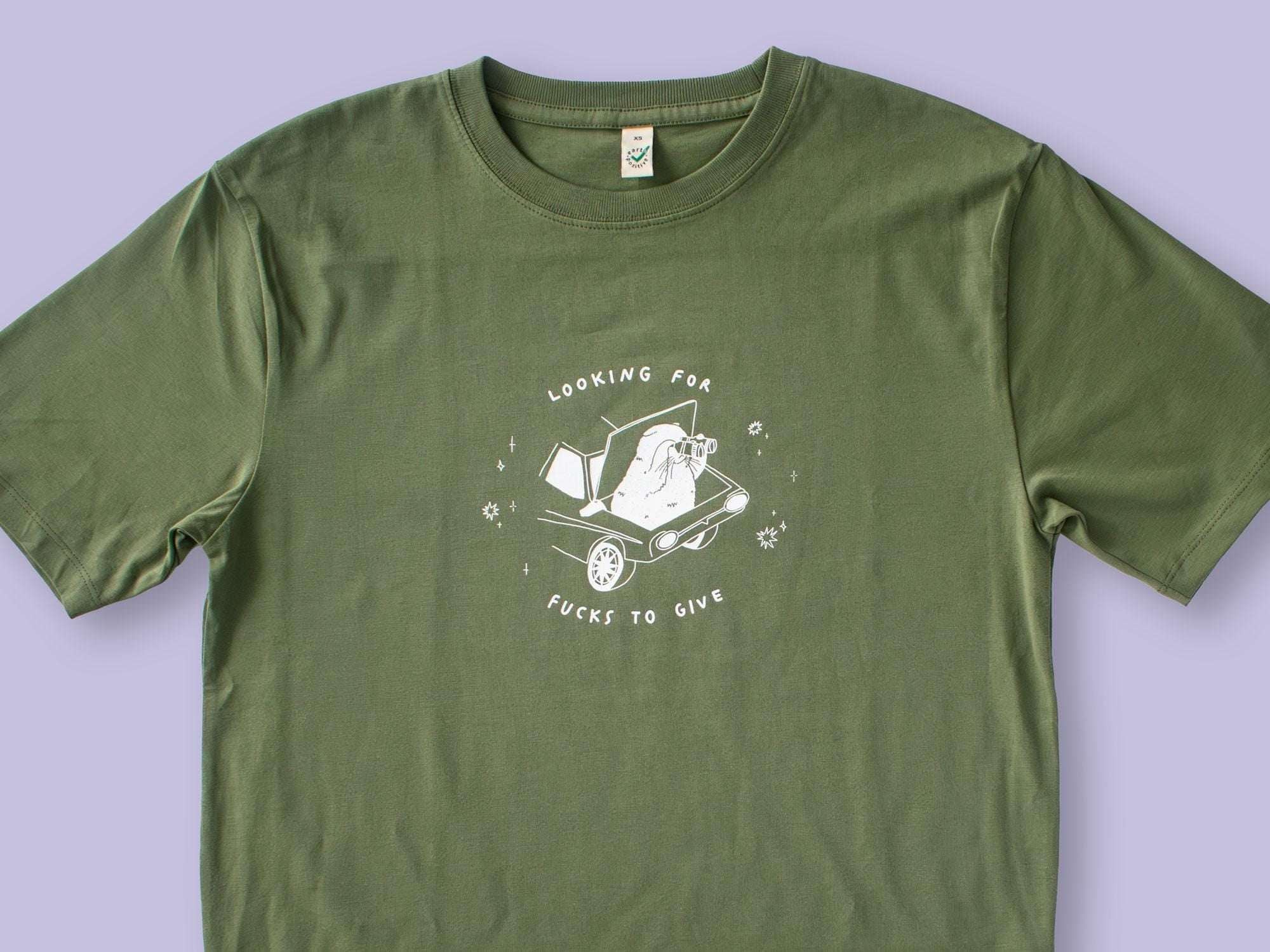 T-shirt: Looking for f***s to give | Hand screen printed olive green organic cotton tee with white illustration of a cat with binoculars