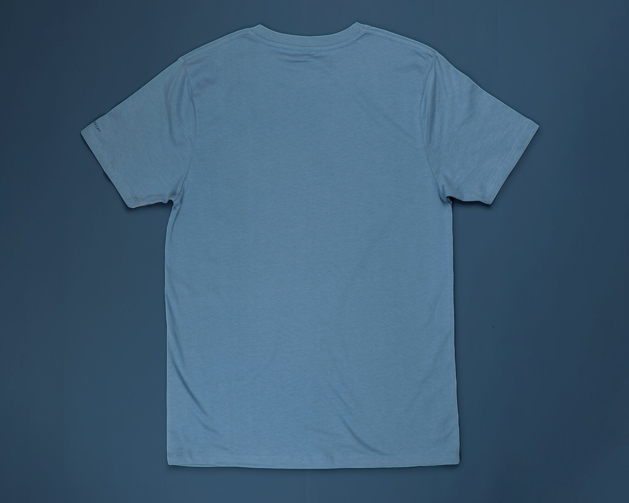 Reflecting cat eyes t-shirt | Hand screen printed on blue organic cotton tee with reflective ink