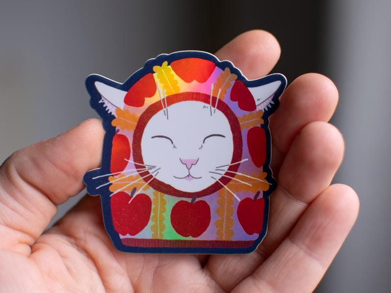 Apple Balaclava Cat Sticker: Holographic Vinyl Decal