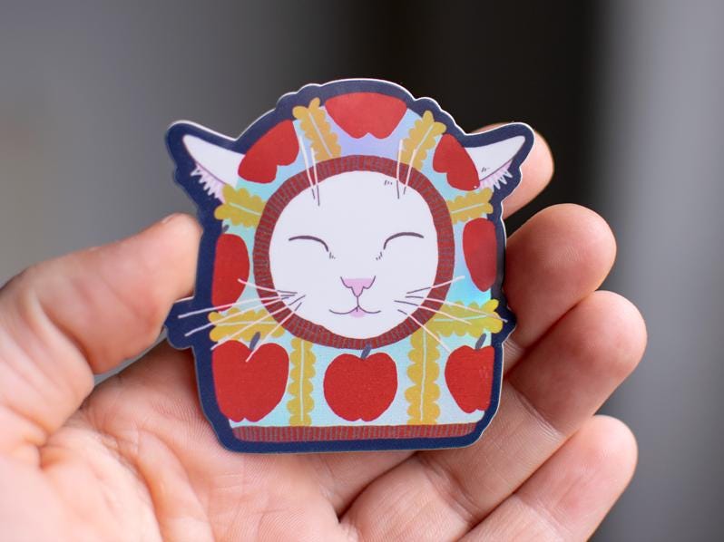 Apple Balaclava Cat Sticker: Holographic Vinyl Decal
