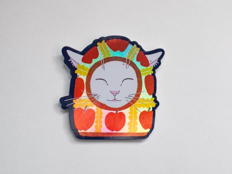 Apple Balaclava Cat Sticker: Holographic Vinyl Decal