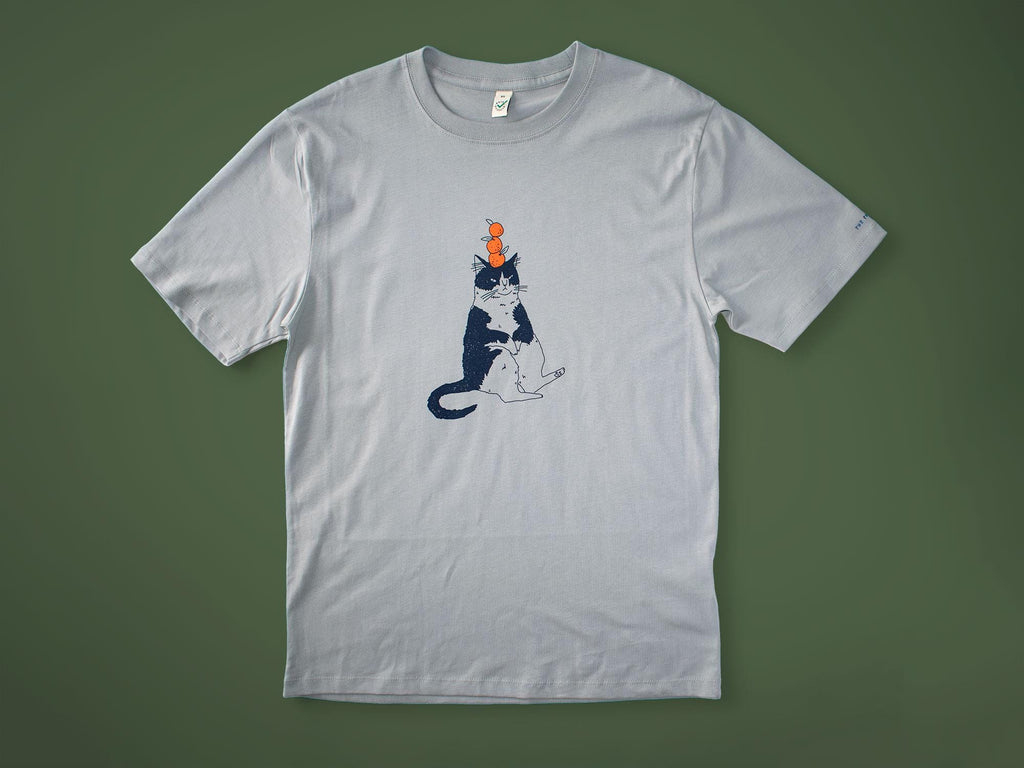 Orange Cat t-shirt | Hand screen printed illustration of a cat balancing oranges on grey organic cotton tee with navy and orange