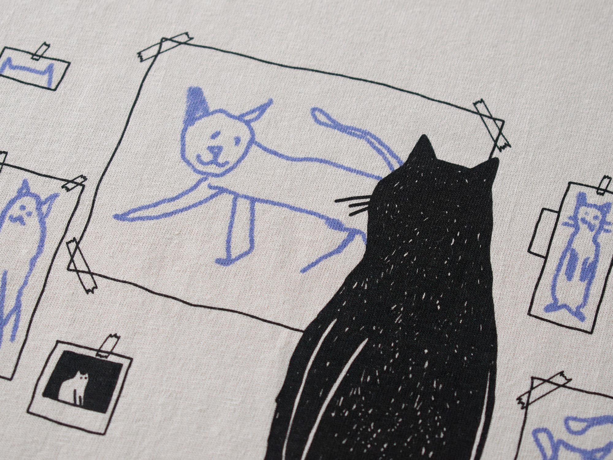 Cat gallery t-shirt | Hand screen printed on beige organic cotton tee with black and blue illustration of a cat judging his own art