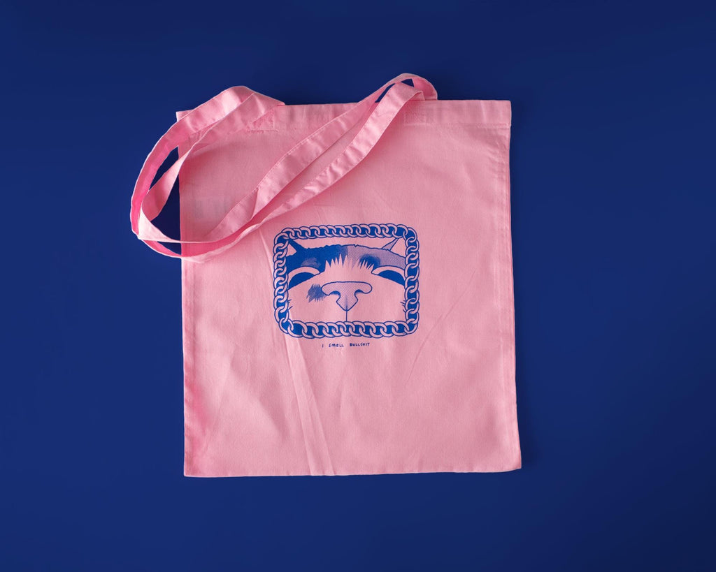 I smell bullshit tote bag | Hand screen printed light pink 100% cotton tote bag with illustration of a cat sniffing out lies