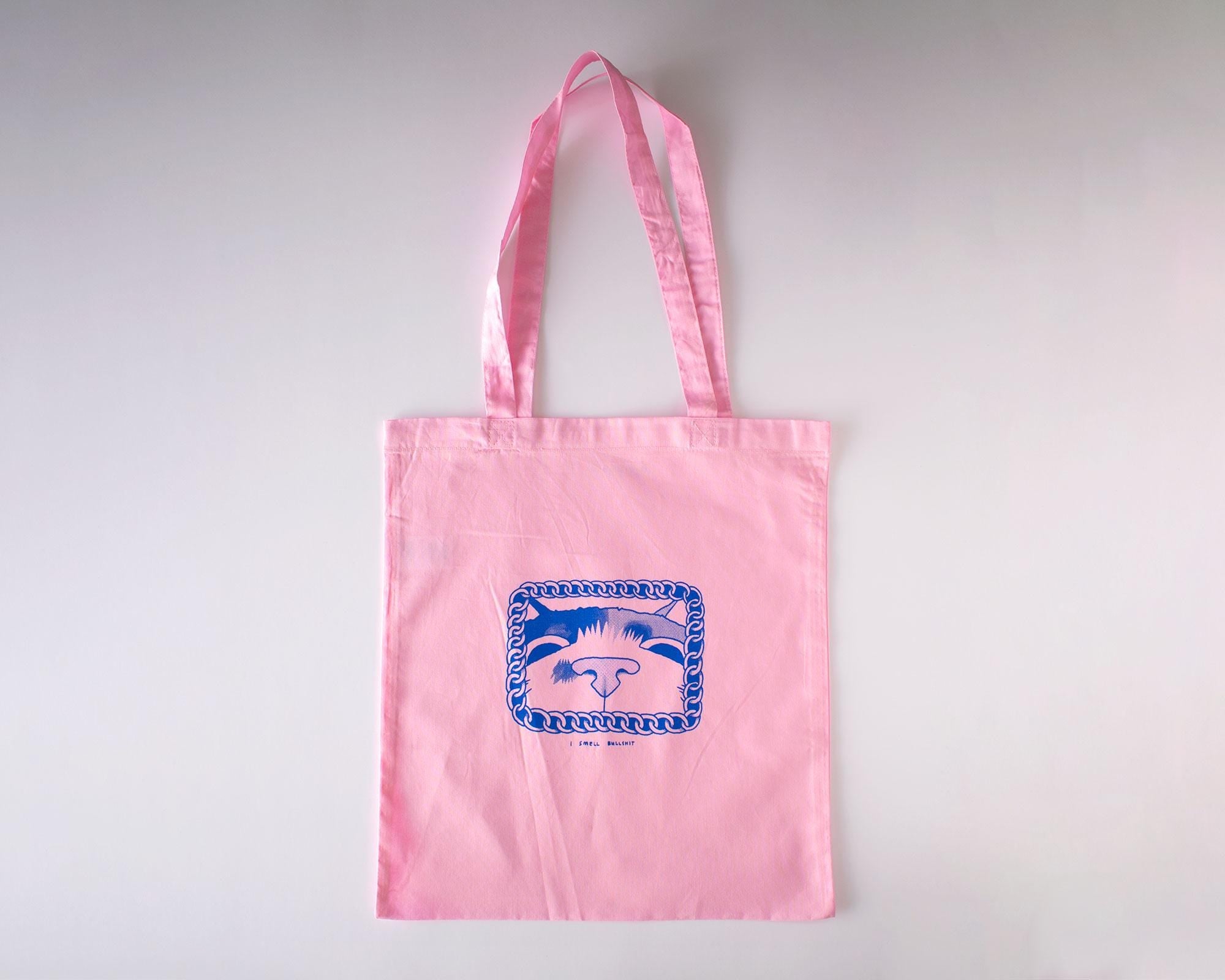 I smell bullshit tote bag | Hand screen printed light pink 100% cotton tote bag with illustration of a cat sniffing out lies