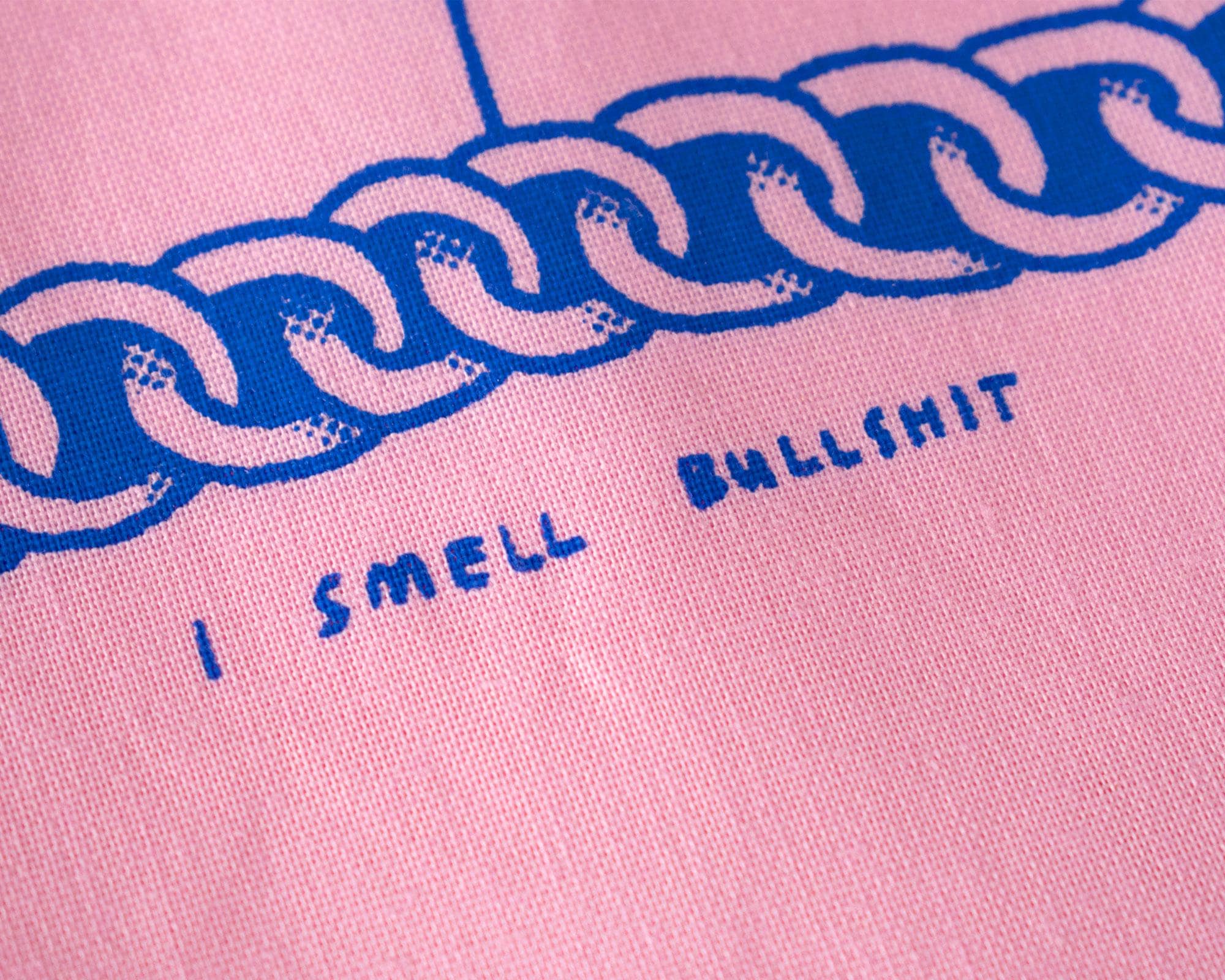 I smell bullshit tote bag | Hand screen printed light pink 100% cotton tote bag with illustration of a cat sniffing out lies