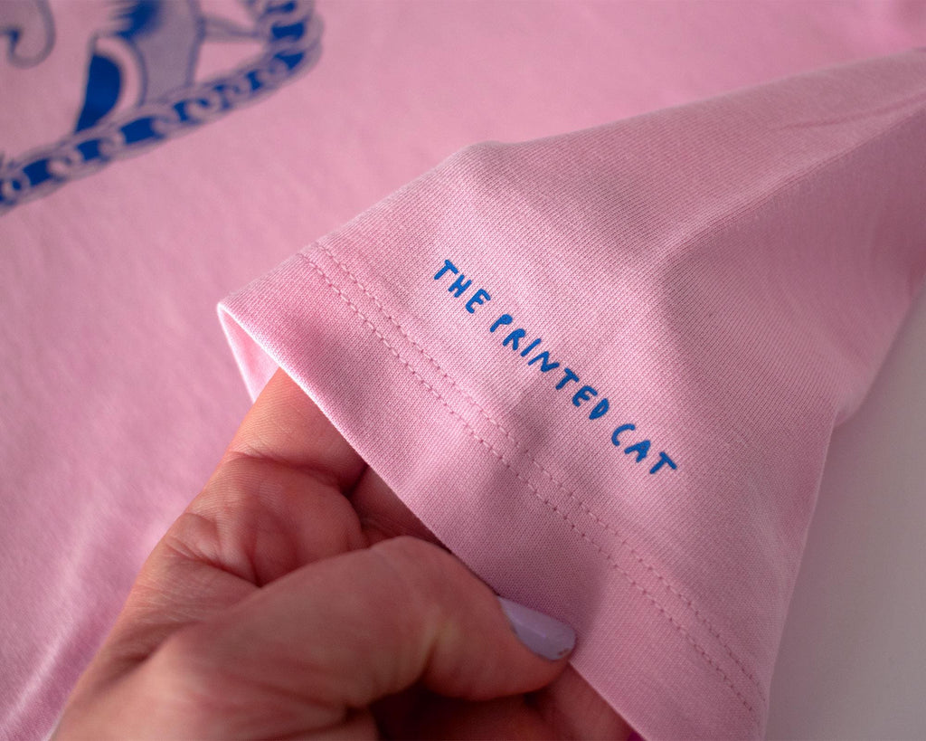 I smell Bullshit crop top | Hand screen printed on light pink 100% cotton cropped tee with blue illustration of a cat sniffing out your lies