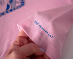 I smell Bullshit crop top | Hand screen printed on light pink 100% cotton cropped tee with blue illustration of a cat sniffing out your lies