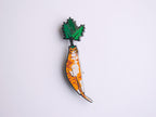 Carrot cat enamel pin | Black nickel plated brooch with an orange tabby cat or is it a carrot? Huh?