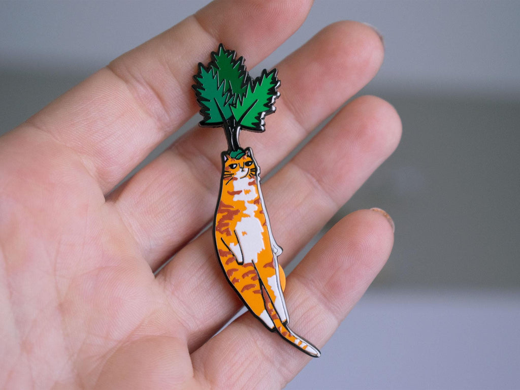 Carrot cat enamel pin | Black nickel plated brooch with an orange tabby cat or is it a carrot? Huh?