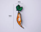 Carrot cat enamel pin | Black nickel plated brooch with an orange tabby cat or is it a carrot? Huh?
