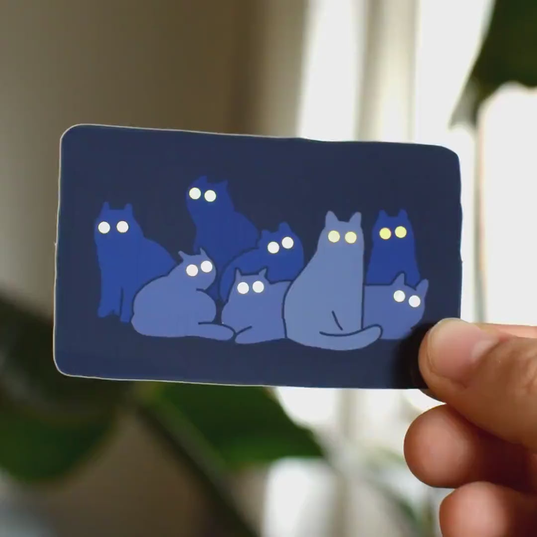 Reflecting Cat Eyes | Spooky holographic vinyl sticker of a cat gangs silhouettes who's eyes are glowing in the night